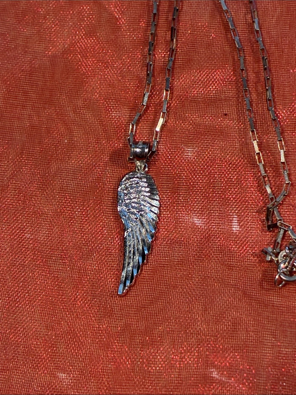 Keep Your Angel Close. 10 K White Gold Wing and 925 18” Chain